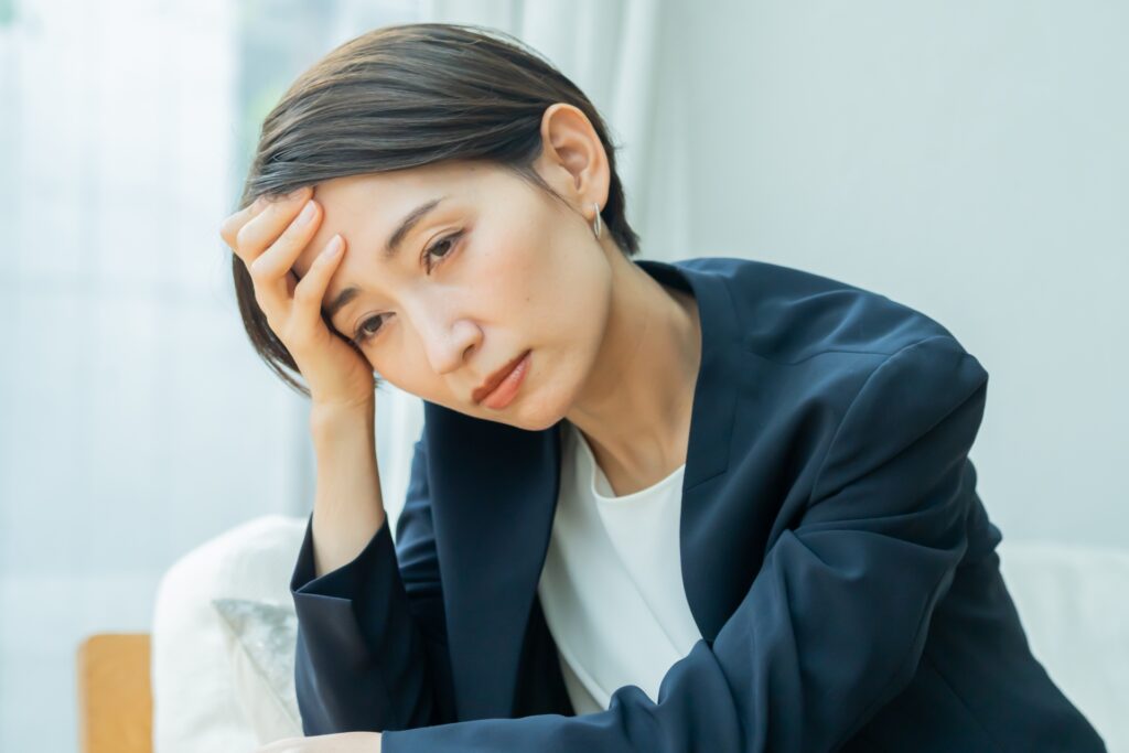 体調が悪そうな女性